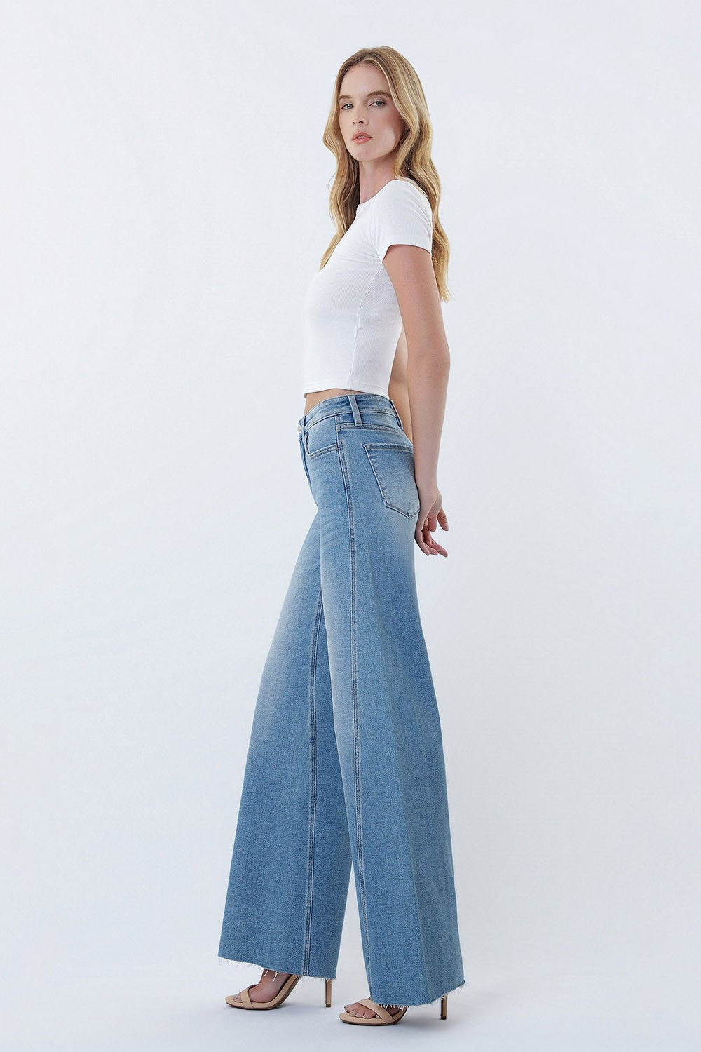 Lovervet High Rise Medium Wash Twisted Seam Wide Leg Jeans