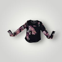 A black undershirt with a floral pattern