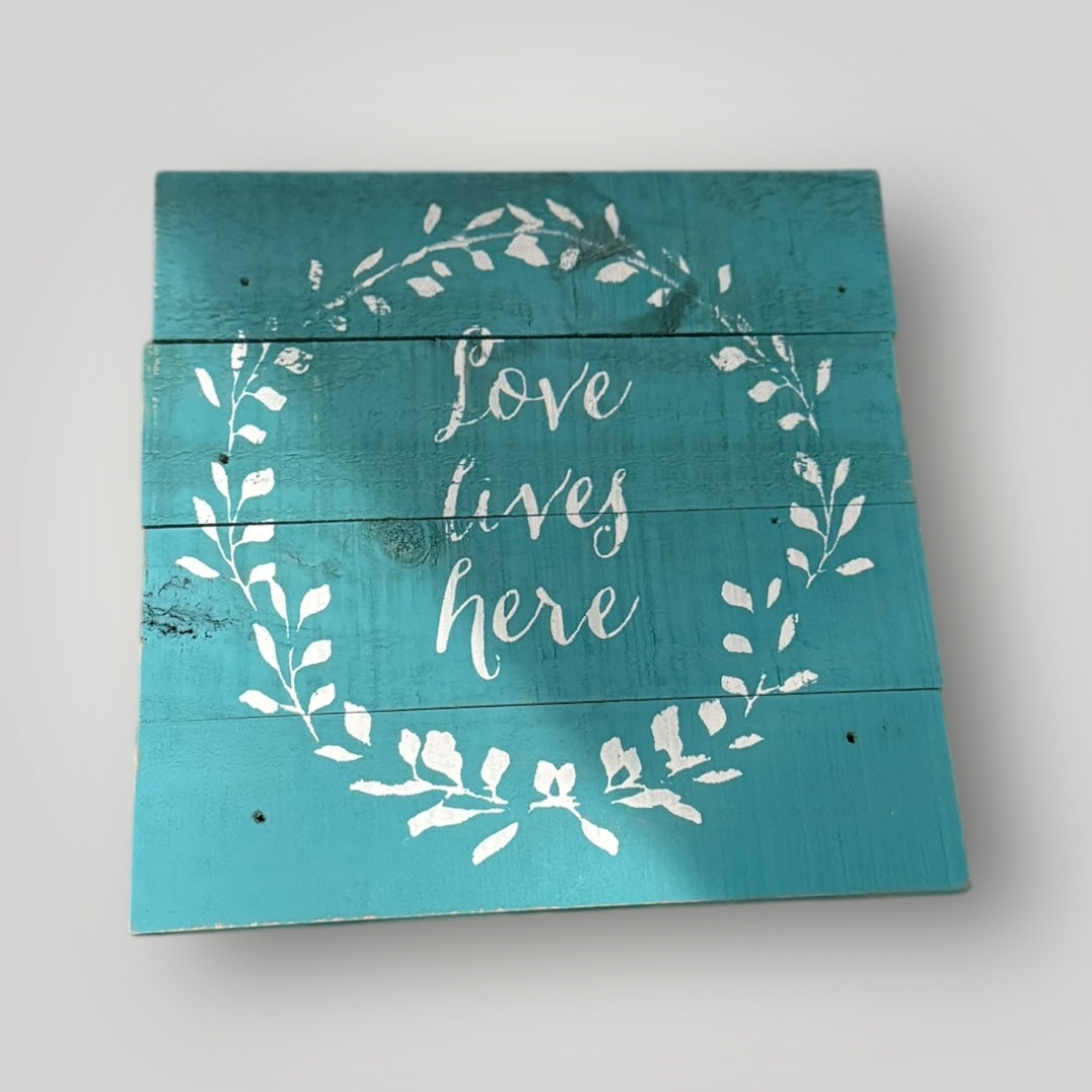 Rustic “Love Lives Here” Wood Sign