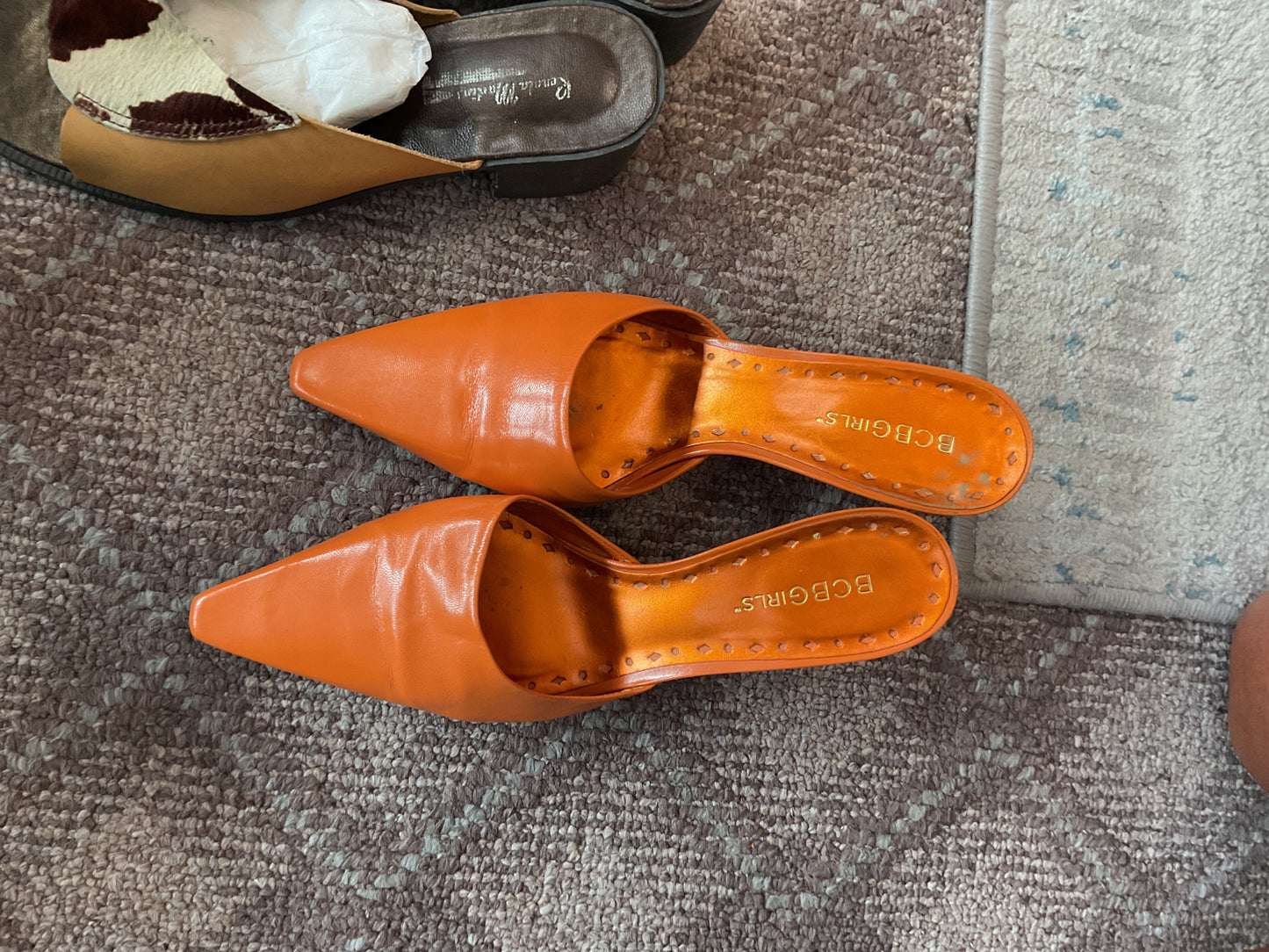 Orange BCBGirls mules, 6.5